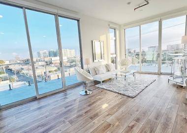 Loft Living Room Style Studio with Floor to Ceiling Windows and Amazing Views